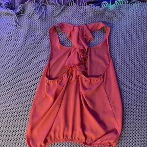 This tank top with ruffles going down the back